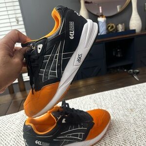 ASICS Gel Saga Black and Orange Sneakers